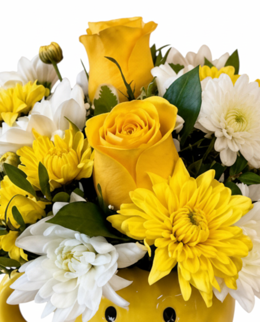 Lakewood Florist yellow smiley face mug filled with bright yellow roses and white chrysanthemums
